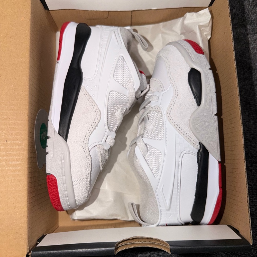Jordan 4 RM White and Varsity Red Sneakers